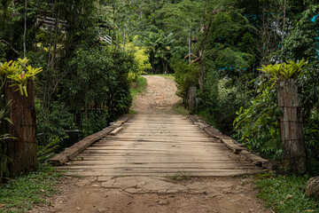 Fototapeta premium Wooden bridge on the dirt road