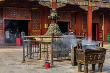 BEIJING, CHINA - AUGUST 28, 2018: Incense burning at Lama Temple (Yonghe Lamasery) in Beijing, China.