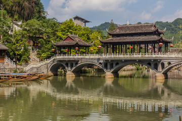 Fototapeta na wymiar Bridge crossing Tuo river in Fenghuang Ancient City, Hunan province, China