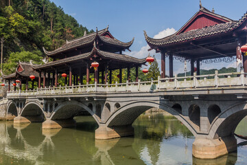 Fototapeta na wymiar Bridge crossing Tuo river in Fenghuang Ancient City, Hunan province, China
