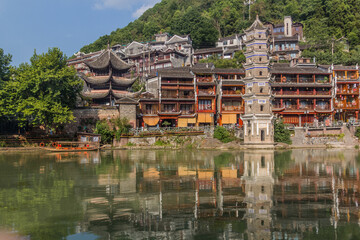 Fototapeta na wymiar Riverside buildings and Wanming Pagoda in Fenghuang Ancient Town, Hunan province, China