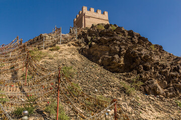 Fences with locks at Overhanging Great Wall near Jiayuguan, Gansu Province, China