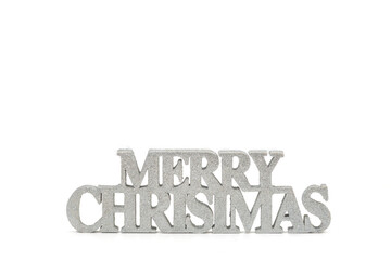 Closeup of a silver coloured Merry Christmas message isolated against a white background. 