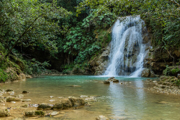 Fototapeta na wymiar Small waterfall of El Limon cascade, Dominican Republic