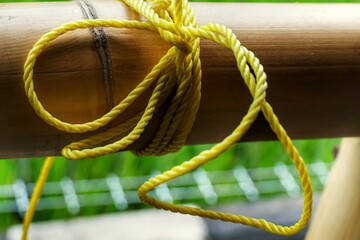 rope on a wooden board