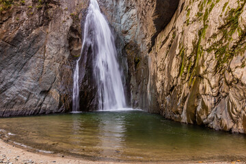 Fototapeta na wymiar Salto Jimenoa waterfall near Jarabacoa town in Dominican Republic