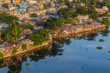 Fototapeta na wymiar Impoverished areas along Ozama river in Santo Domingo, capital of Dominican Republic.