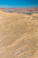 Swirling Patterns In Sandstone Rim at The Lunar Like  Landscape of Moonscape Overlook, Near Hanksville, Utah, USA