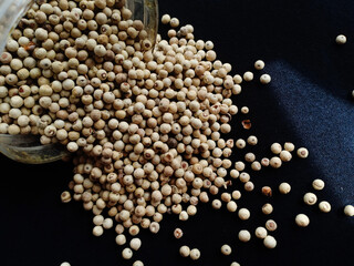 pepper on a black background