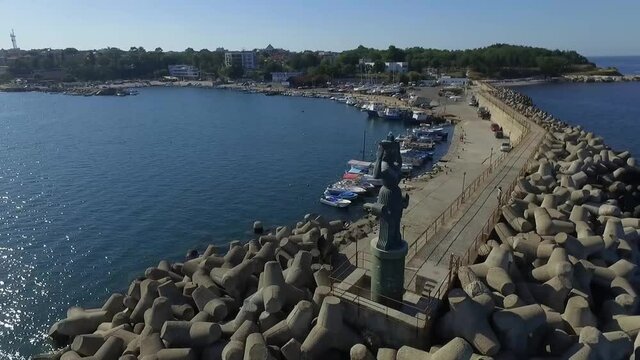 Aerial view from the Tsarevo port including the unique woman shaped lighthouse.