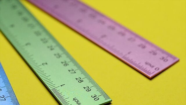 Metal Marking Ruler on Yellow Background