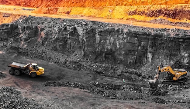 Excavators working on a manganese mining site in South Africa