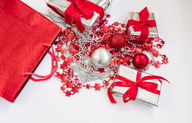 Christmas gifts and tree decorations in red and silver colors