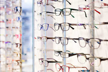 Image of glasses showcase at modern optic shop, nobody
