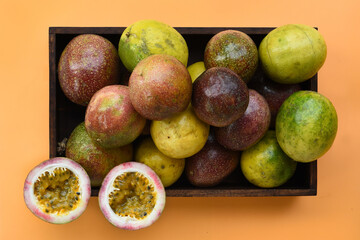 close up of fresh purple passion fruits harvest from farm