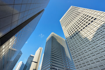 Fototapeta na wymiar High-rise buildings of fine weather - Shinjuku, Tokyo, Japan 　高層ビル　ビジネス街 　新宿 