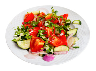Delicious summer salad of cucumbers and tomatoes on a plate. Isolated over white background