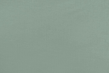 Blue green homogeneous background with a textured surface