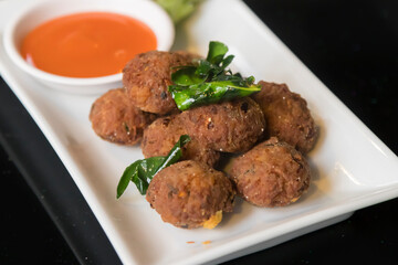 Larb Moo Tod, Thai minced pork balls with fried lime leaves and chili sauce