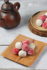 Moci merah putih. Red and White Mochi or moci cake. One of traditional snack from Indonesia. Made from glutinous rice flour with sugar and roasted peanut filling.