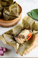 Gadon Daging or Botok, one of Indonesian traditional food. Made of minced beef and wrapped with...