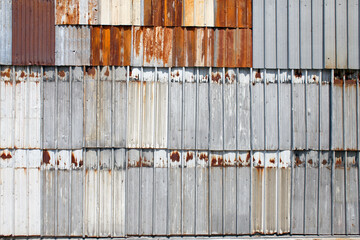 Rusty corrugated metal wall or rusty Zinc grunge for background.
