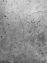 The floor old cement surface has cracks. Vertical images for background, wallpaper, design, text..
