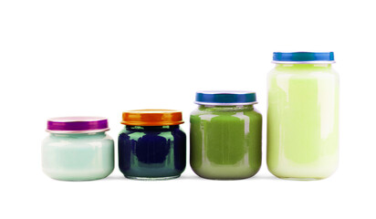 Jars with different baby food on white background