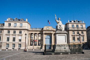 Naklejka premium French National Assembly or Bourbon Palace back entrance on University Street) with Law statue in Paris, France.