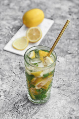 Glass of citrus mojito on  table
