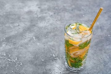 Glass of citrus mojito on  table