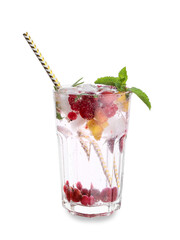 Glass of cold mojito with berries and fruits on white background