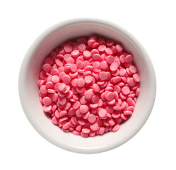 Bowl with sweet sprinkles on white background