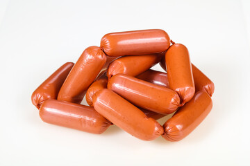 Tasty meat sausages over white background