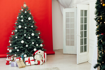 Christmas tree pine with gifts new year interior decor background