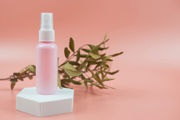 Pink cosmetic bottles for cream, gel, lotion. Skincare cosmetic concept.