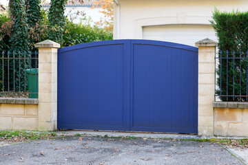 modern blue door metal home gate at entrance of house portal