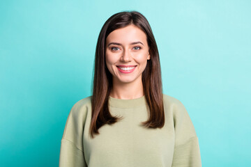 Fototapeta premium Photo portrait of smiling woman isolated on vivid teal colored background