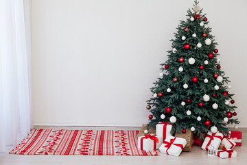 White room Christmas tree pine with gifts new year interior decor