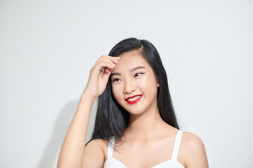 Fototapeta premium Portrait of a smiling happy young woman