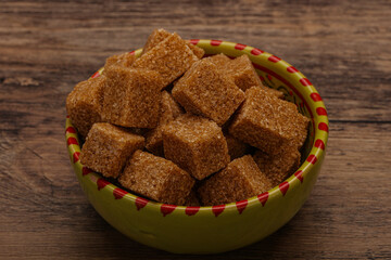 Cane sugar cubs in the bowl