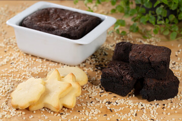 Set of baked and and cut brownies with cookies for holiday celebrations.