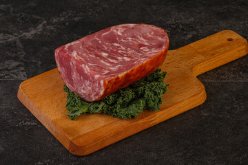 Beef ham piece over board
