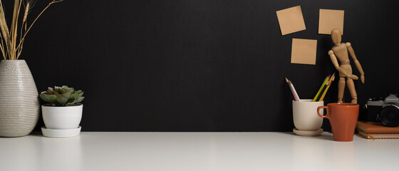 Worktable with copy space, supplies and decorations in home office room