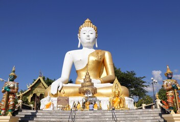 golden buddha statue, Wat Phra That Doi Kham, chiang mai, thailand