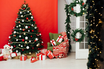 Holiday Christmas tree pine with gifts new year interior decor red green
