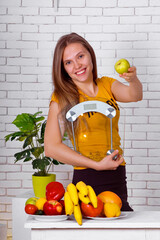 girl in yellow t-shirt weight loss scales and Apple