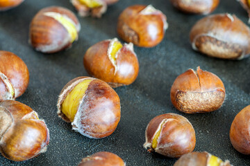 Close-up of chestnut roasted in an electric baking pan