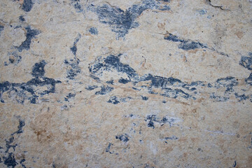 Grunged cement texture on dark plywood background.  Grunge textured wall for your design.