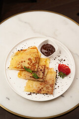 Healthy breakfast table with Crepes, blueberries